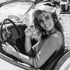 1960s-ann-margaret-in-triumph-tr3-roadster-retrographs.jpg.8715c5f22c715fb8a0cd145621e580b2.jpg
