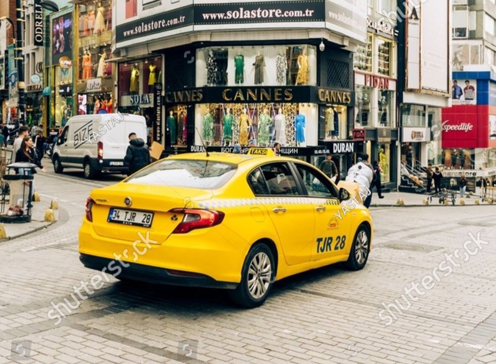 stock-photo-istanbul-turkey-taxi-car-fiat-with-sign-taksi-speeding-by-stores-in-laleli-area-2354380187.jpg.fe42a87a6be711976056d219aaa41bd5.jpg